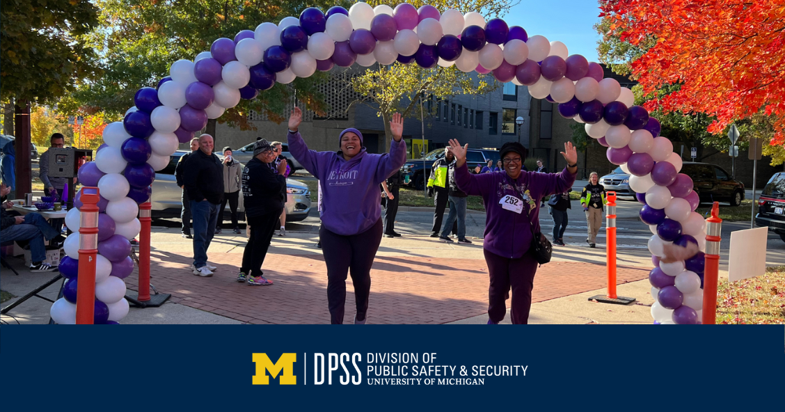 Photo of two Purple Run participants at the finish line.