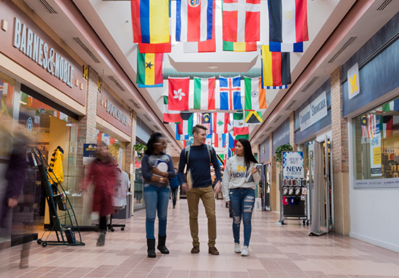 Photo of students walking through U-M North Campus Pierpont Commons.